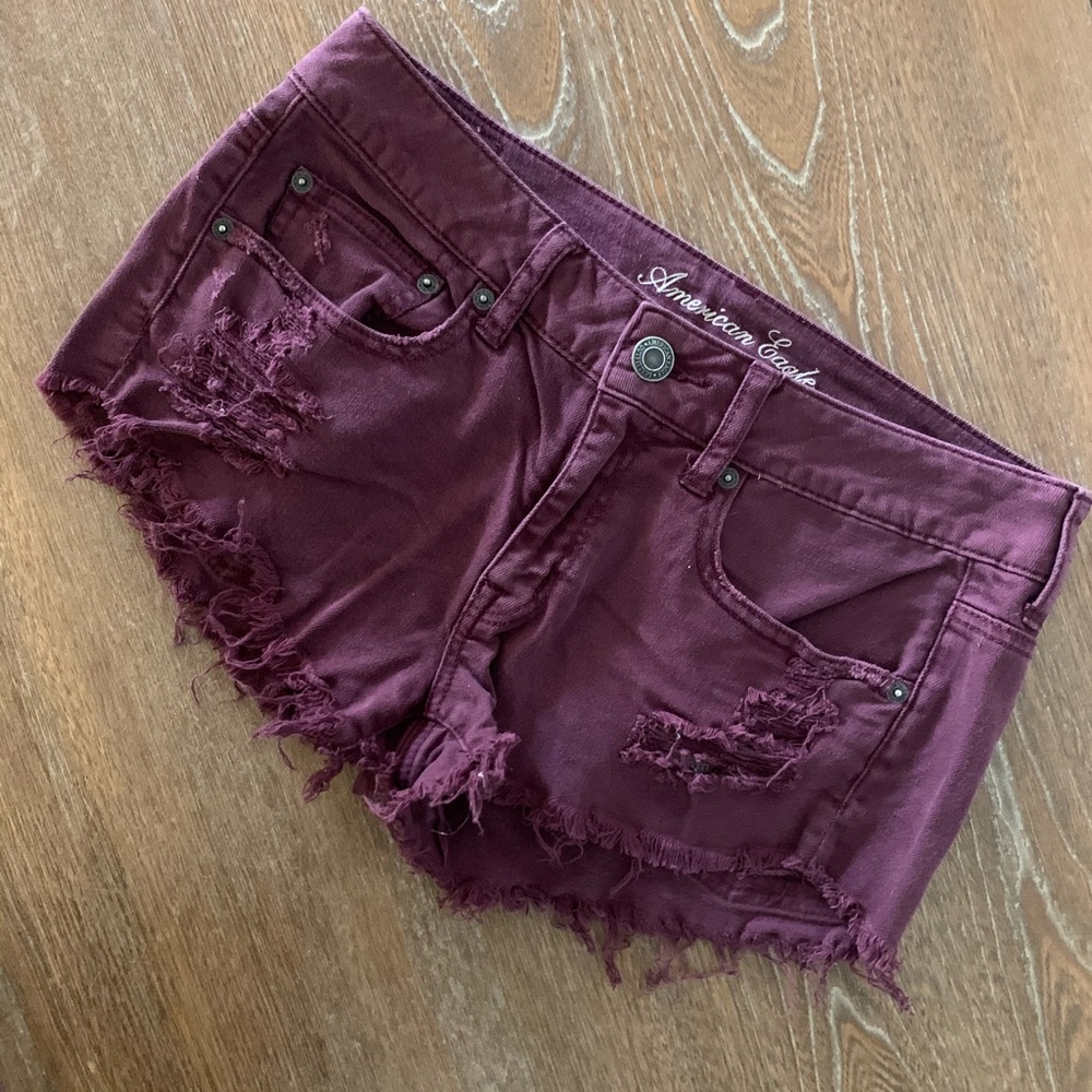 Burgundy size 6 distressed  jean shorts